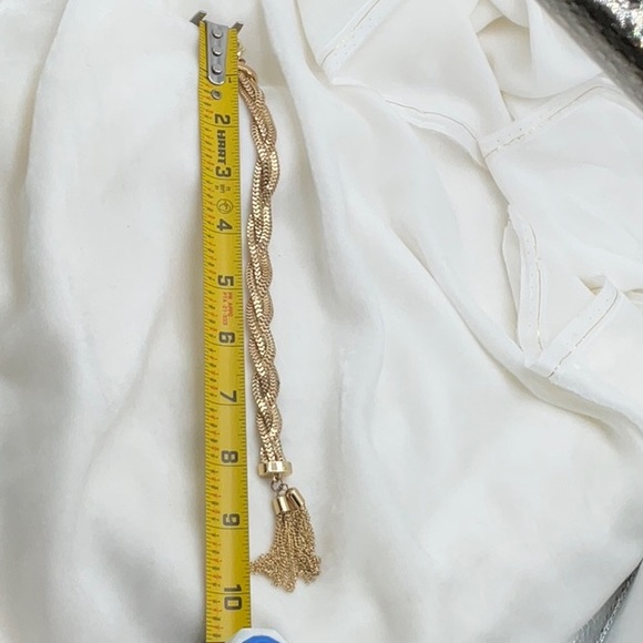 Gold-Tone Braided Bracelet With Two Attached Tassels - Picture 13 of 13